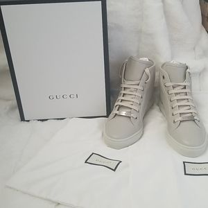 NWT  Gucci Hightop sneakers.